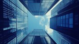 Low angle view of modern skyscrapers reaching for a partly cloudy sky.