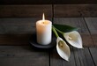 © AdityaGM - Peaceful candlelight scene with white Calla lily on rustic wood. Generative Ai