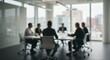 © Outkast - Blurred image of business people in a meeting