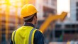 © Mas - Construction Worker Observing Site Progress at Sunset
