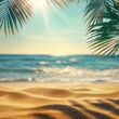 © Stock by Anika - Abstract blur defocused background, nature of tropical summer beach with rays of sun light. Golden sand beach, sea water and palm leaves against sky. Copy space, summer vacation.