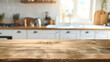© Malik - Wooden table on blurred kitchen bench background. Empty wooden table and blurred kitchen background