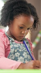 Leinwandbilder - Color, education and kid with drawing in classroom for creativity, growth or development. Marker, child and student with stationary for learning with project, homework or book at elementary school.