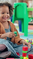Poster - Kindergarten, child and happy with blocks for education, creative and cognitive development in class. School, students and girl with building toys for learning, motor growth and problem solving skill