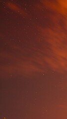 Wall Mural - Sunset Cloudy Sky With Fluffy Clouds. Sunset Sky Natural Background. Dramatic Sky. Sunset In Yellow, Orange, Pink Colors. Day To Night Transition. Cloudy Sky With Fluffy Clouds. Natural Background
