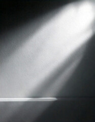 Poster - Sunlight beam shining on a wall, creating a bright spot and shadows. Interior design element with light and shadow contrast.
