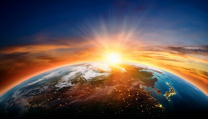 Wall Mural - sun rising on earth