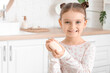 © Pixel-Shot - Little girl with soap bar in bathroom, closeup