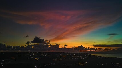 Sticker - Timelapse Of Sunset With Ocean, Clouds And Townscape In Bali, Indonesia