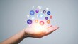 © ศิวาพร ทูปคันโธ - Hand Holding Glowing Digital Icons Representing Online Shopping Deals and Discounts Discover amazing offers and sales