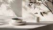 © GASTAN ALVARENDRA ST - Elegant, minimalist scene with a ceramic bowl and cylinder.