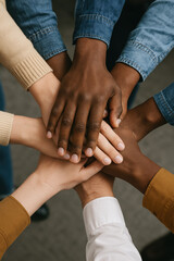 Fototapete - Hands of diverse people stacked together in unity and teamwork