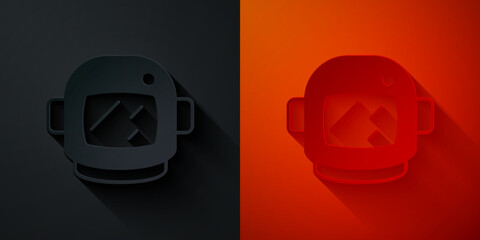 Poster - Paper cut Astronaut helmet icon isolated on black and red background. Paper art style. Vector