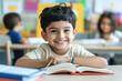 © Shivani - cute little boy reading book in the classroom