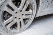 © Andrii_Abriutin - Close-up of a car wheel being washed at a professional car wash facility.