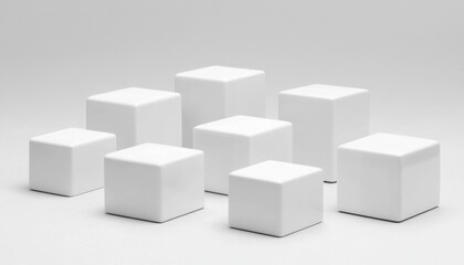 Poster - Arrangement of white cubic blocks in a studio setting highlighting minimalist design and geometric shapes against a plain background emphasizing form and texture.