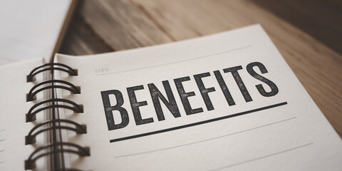 close-up of notebook page showing the word benefits, printed in bold, black type, representing busin