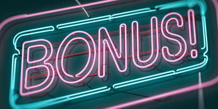 Close-up of pink and teal neon sign spelling 