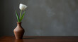 © Ednardo - Elegant white tulip in a clay vase, a simple yet captivating still life showcasing natural beauty against a neutral backdrop.