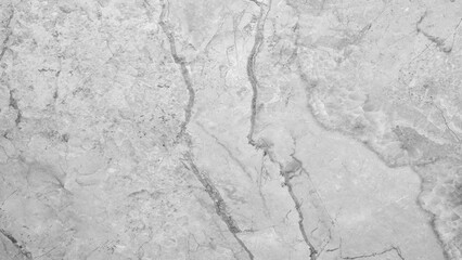 Leinwandbilder - A white marble wall with a crack in it. The crack is long and jagged, giving the wall a rough and uneven appearance