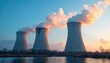 © Sourithideth - Industrial cooling towers emitting vapor against a blue sky , construction, machinery, image