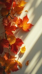 Poster - Indoor display of autumn leaves in warm shades of red and orange
