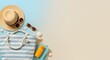 © SRD - Summer vacation flat lay with straw hat and striped beach bag on blue background, tropical travel accessories with copy space for seasonal marketing
