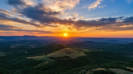 Poster - Stunning sunset over rolling hills and distant mountains, vibrant orange and purple hues paint the sky, creating a breathtaking landscape panorama. : Generative AI
