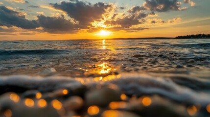 Fototapete - Golden sunset over calm ocean waters, view from below the surface, showing small stones and wavelets shimmering with reflected sunlight. : Generative AI