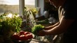 © Suphawan - Morning kitchen light illuminating a man washing vegetables in the sink, fresh parsley and tomatoes in view