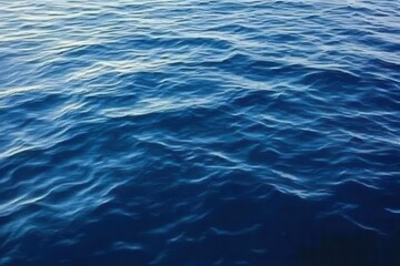 Aufkleber - Rippled Blue Ocean Surface With Subtle Waves Under Natural Light Showing Water Texture and Deepness and Cleanliness of Marine Environment