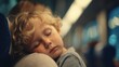 © Scott - A child resting their head on their new parent's shoulder during a quiet train ride