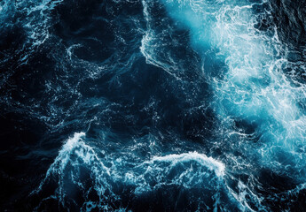 Poster - Aerial view of deep blue ocean water with whitecaps and foam, showing contrasting textures and shades of blue. : Generative AI