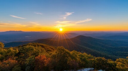 Aufkleber - Spectacular sunset over layered autumnal mountains, showcasing vibrant colors and sun rays piercing through the peaks. : Generative AI