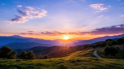 Poster - Serene sunset over rolling hills and mountains, showcasing vibrant orange, purple, and blue hues in the sky, with a sunbeam path illuminating the landscape. : Generative AI