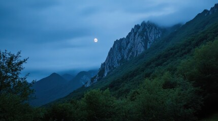 Aufkleber - Serene night scene featuring a full moon illuminating a majestic mountain range, its rocky peaks partially shrouded in mist, overlooking a lush, dark forest. : Generative AI