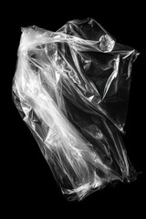 Leinwandbilder - Abstract image of a crumpled transparent plastic bag on a black background, showcasing its texture and form in monochrome. : Generative AI