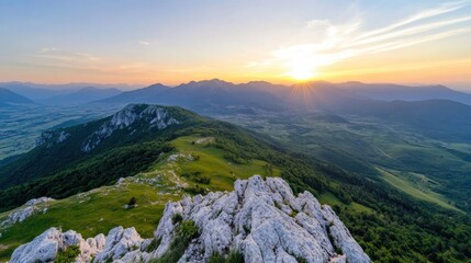 Poster - Majestic sunset over a sprawling mountain range, showcasing a rocky peak and lush green valleys bathed in the golden hour light.  The scene offers a breathtaking panorama of nature's b : Generative AI