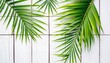 © DITSARAPHAN - Vibrant green tropical palm leaves arranged on a rustic white wood background Plenty of copy space, pattern, copy space