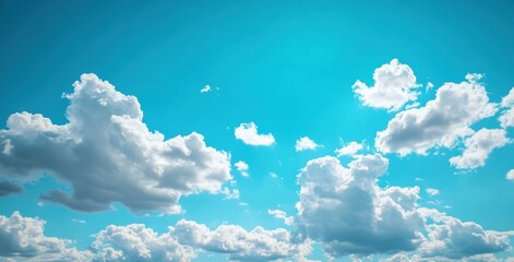 Aufkleber - A vibrant, azure sky filled with fluffy cumulus clouds, creating a serene and peaceful atmosphere. The bright sunlight illuminates the clouds, casting soft shadows. : Generative AI