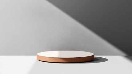 Leinwandbilder - Minimalist product display: a round wooden platform with a white top sits on a light gray surface, bathed in sunlight creating a dramatic shadow. : Generative AI