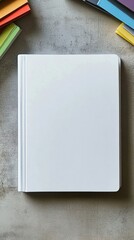 Aufkleber - Blank white notebook on gray textured surface, surrounded by colorful stationery; ideal for mockup or branding projects. : Generative AI