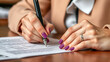 © Frank - Close up on woman's notary public hand stamping the document. Notary public concept.