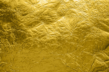 Wall Mural - luxury shiny metallic golden foil crumpled texture background