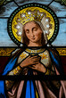 © Joan - Stained glass (19th century) of Crowned Virgin Mary.