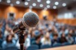 © AndiAzis - Microphone in front of blurred audience