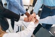 © standret - Top view of hands of business people that are celebrating success