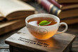 © Jayeda akter - Steaming cup of tea with leaf celebrating international tea day on wooden surface
