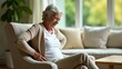 © Gayan - Elderly Woman Suffering From Back Pain