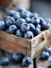 Fototapete - Fresh Blueberries in a Rustic Wooden Box on a Table With a Soft Blurred Background
